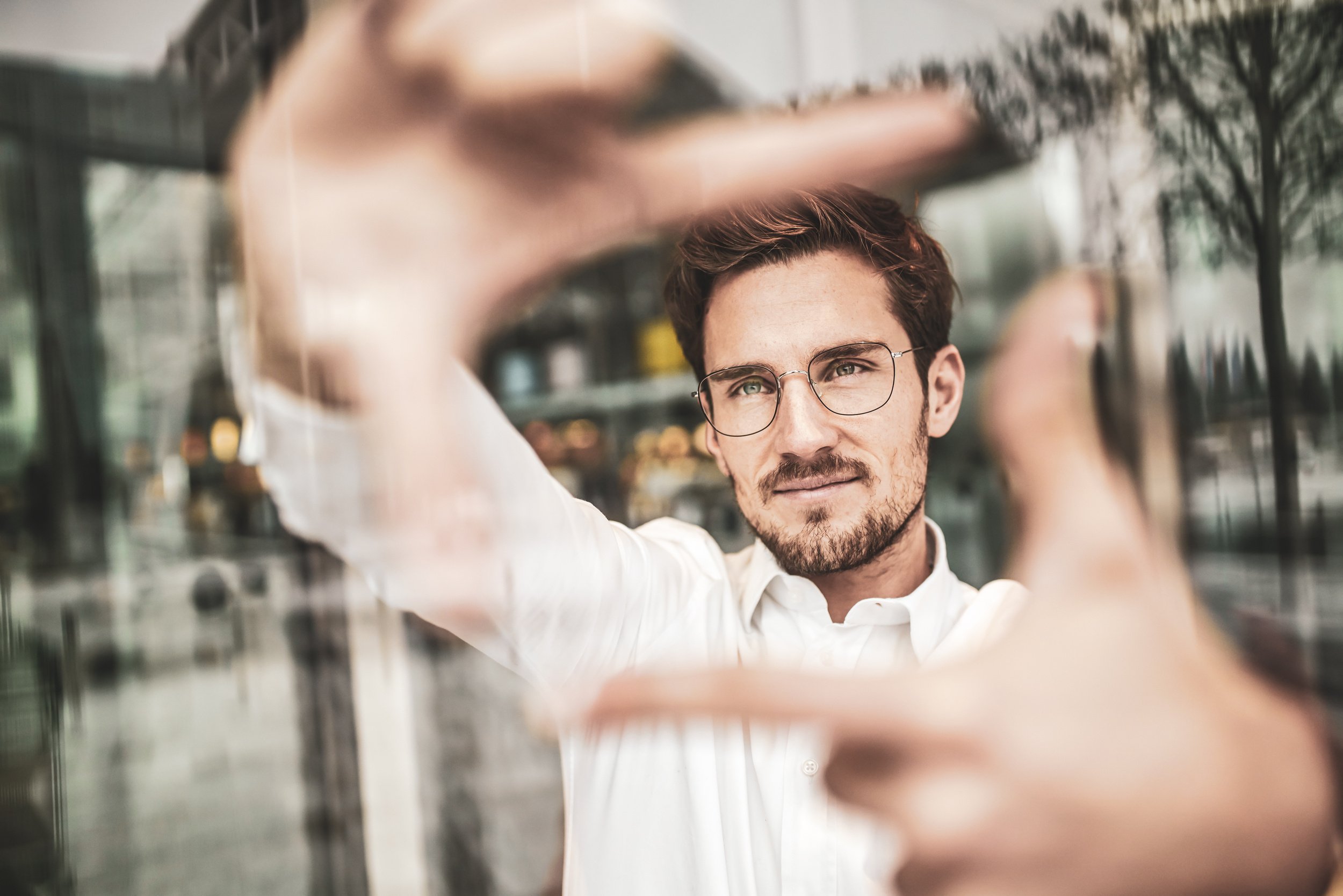 27. Portrait-of-man-building-frame-with-his-fingers_202357_large