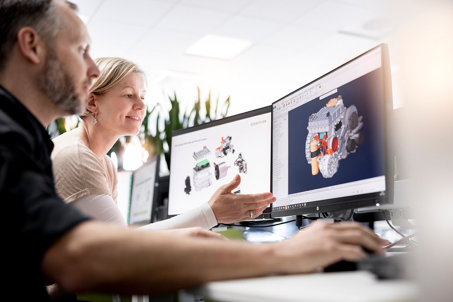 3. Engineers-in-their-office,-working-on-monitors-and-computers_684353_master